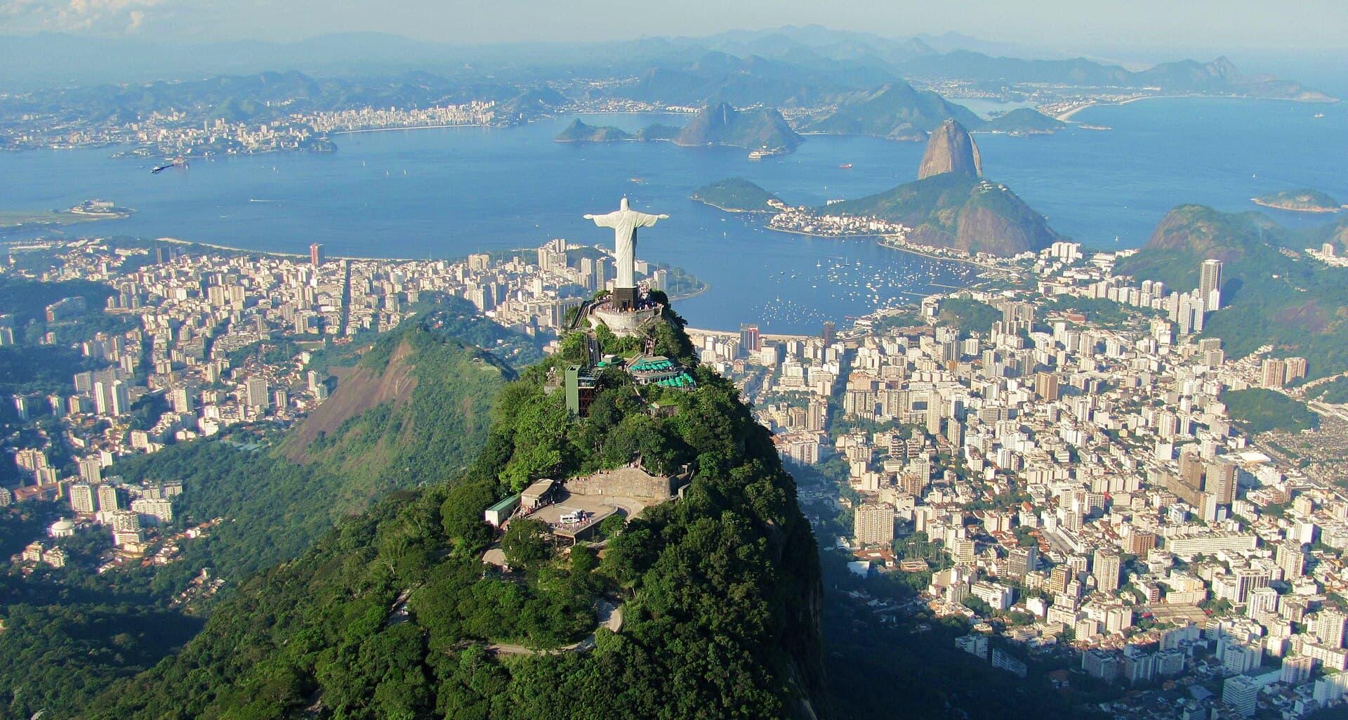 Panoramic from Corcovado — Christ overlooking Sugarloaf and Guanabara Bay.